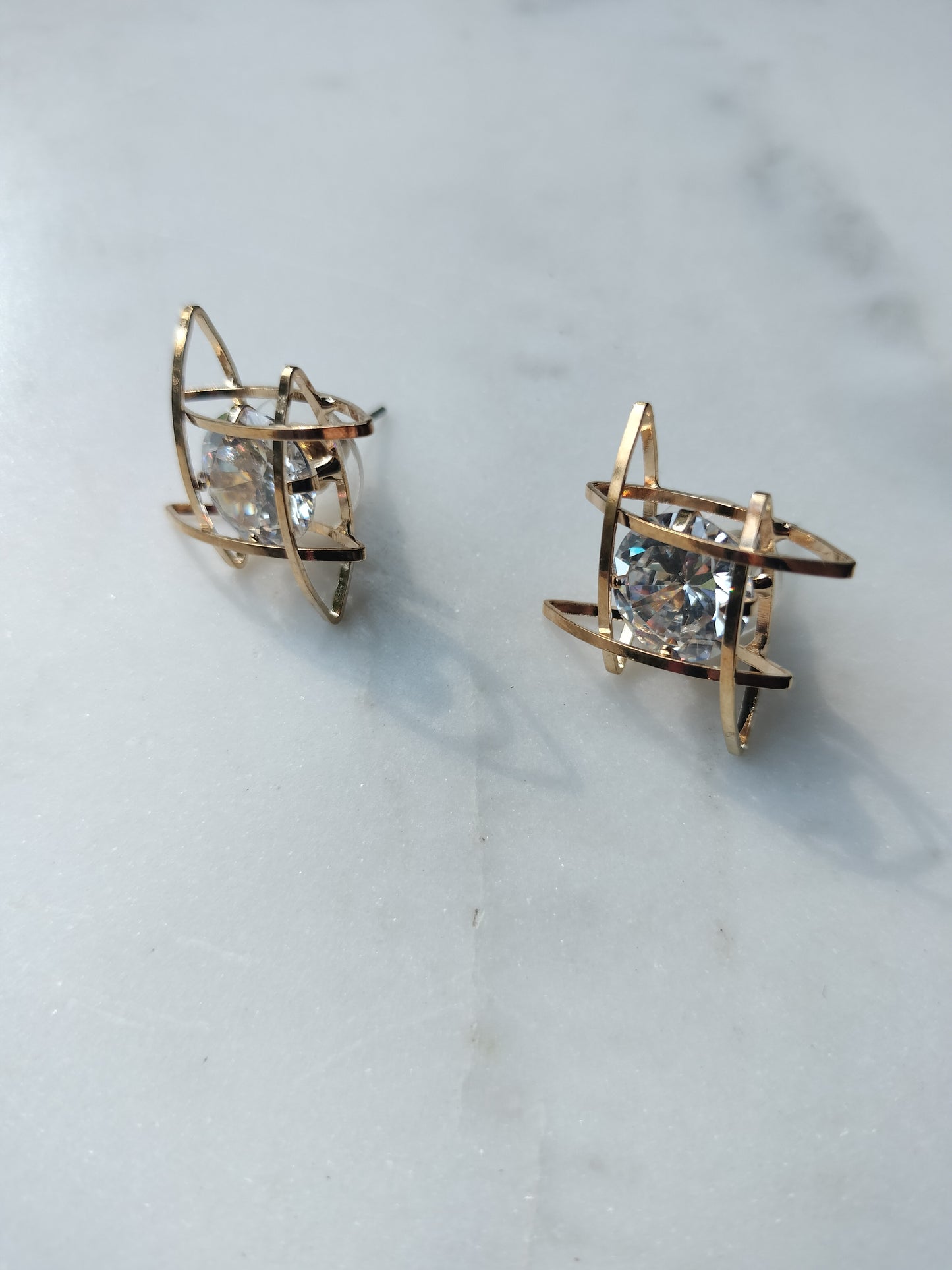 Three-dimensional cubic zirconia earrings