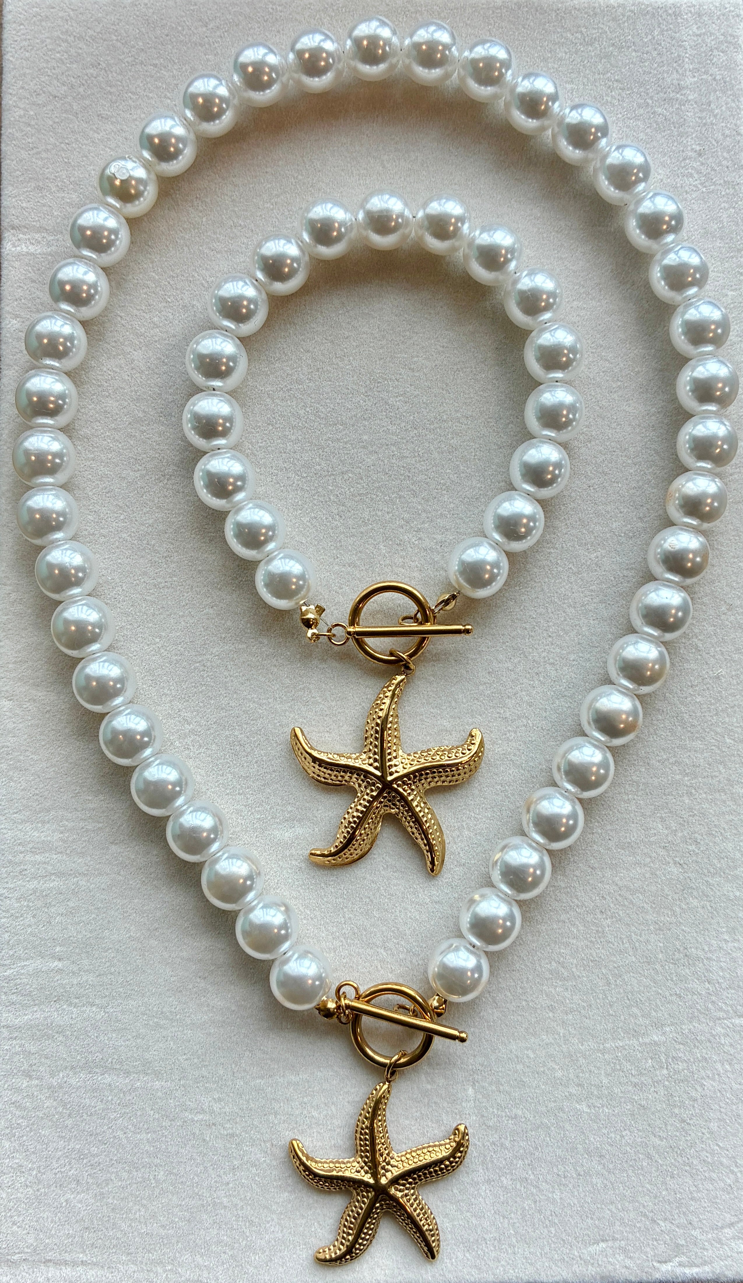 Star fish and pearls necklace and bracelet set.