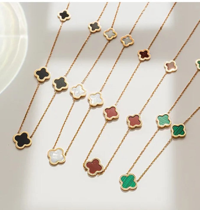 18k gold plated stainless steel black flower necklace.