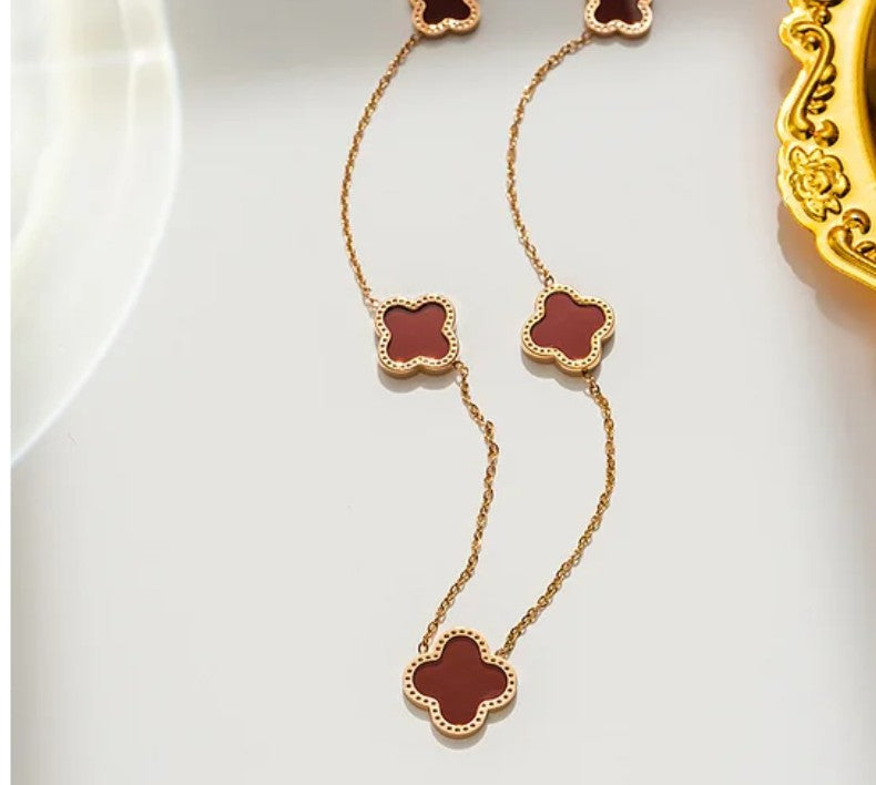 18K Gold PVD plated stainless steel red flower necklace.