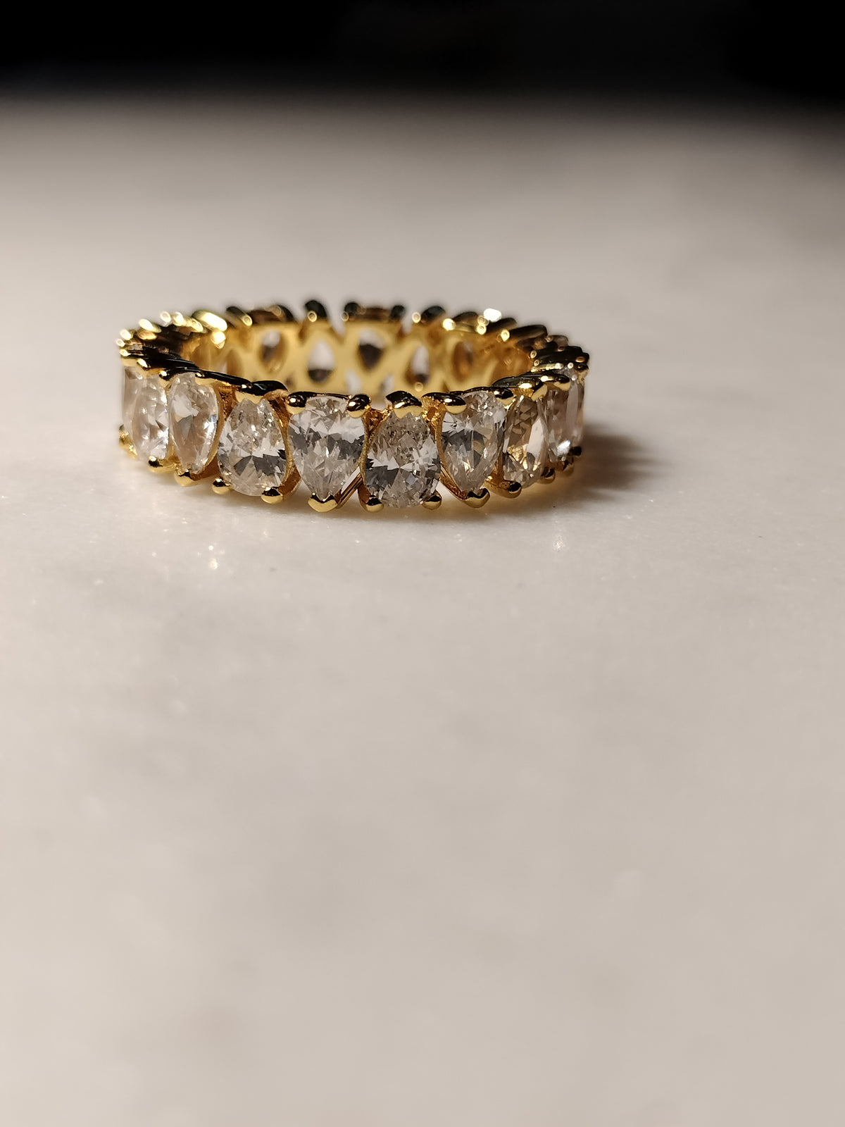 925 Sterling Silver 18 karat gold plated tear drop crystal ring in size 7.