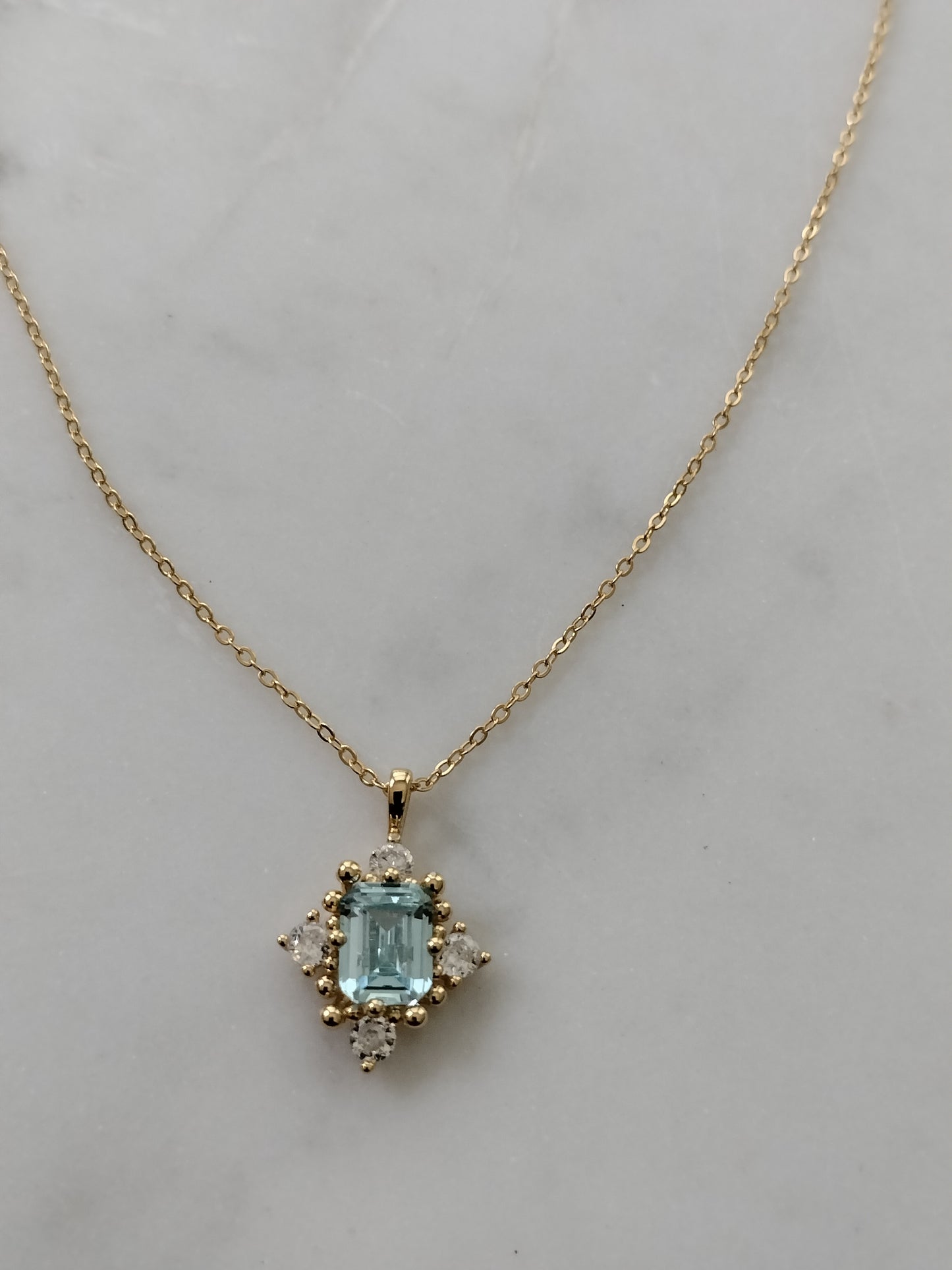 925 Sterling Silver 18k gold plated princess necklace with blue and white zirconia.