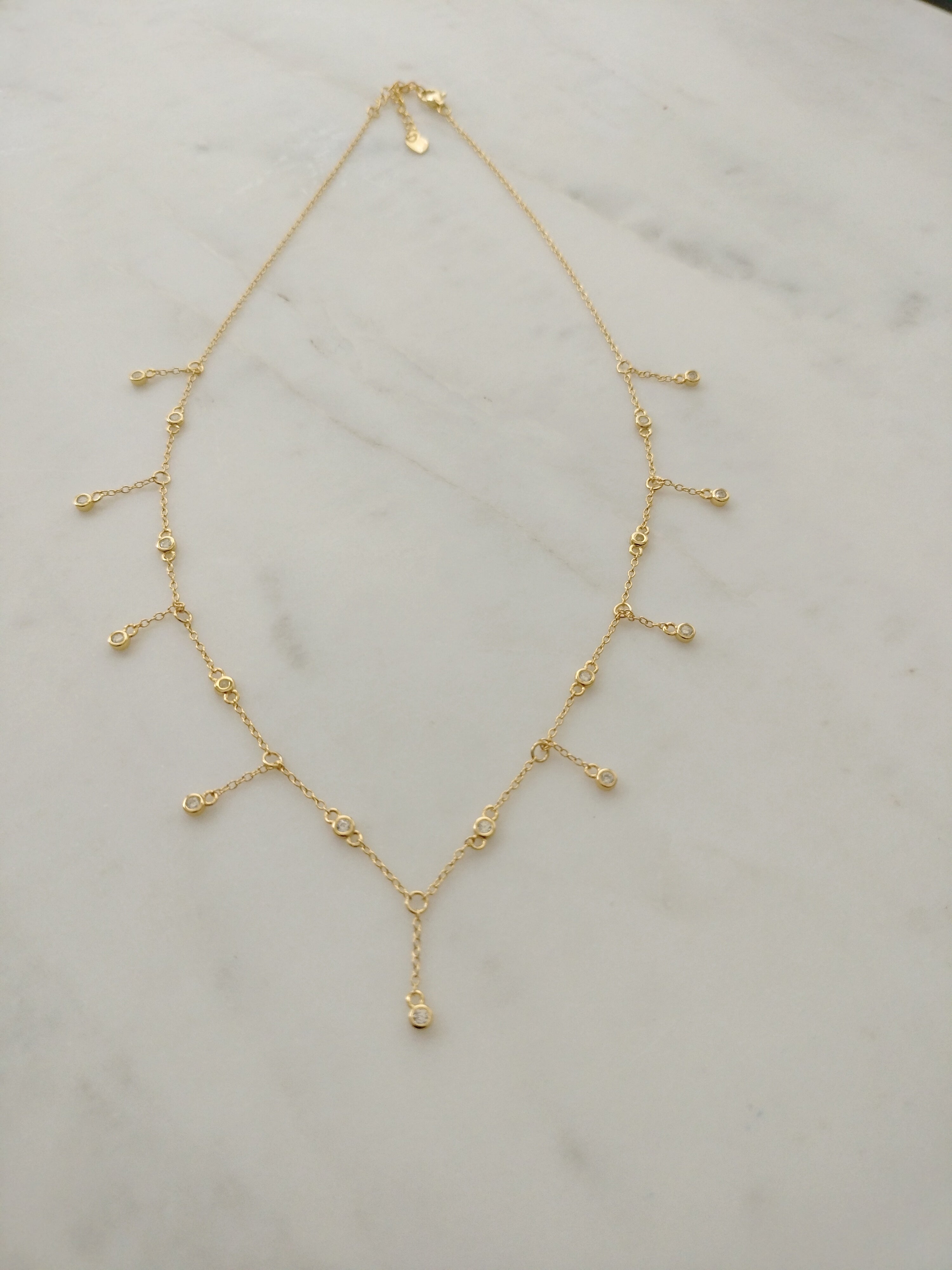 925 Sterling silver Sparkle drop necklace 18 karat gold-plated with hanging crystal pendants.