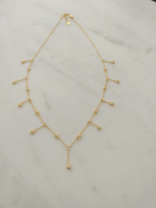 925 Sterling silver Sparkle drop necklace 18 karat gold-plated with hanging cubic zirconia pendants.