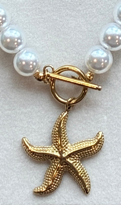 Star fish and pearls necklace and bracelet set.
