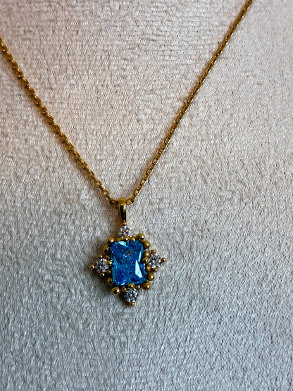 925 Sterling Silver 18k gold plated princess necklace with blue and white zirconia.