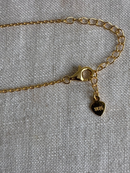 925 Sterling Silver 18k gold plated princess necklace with blue and white zirconia.