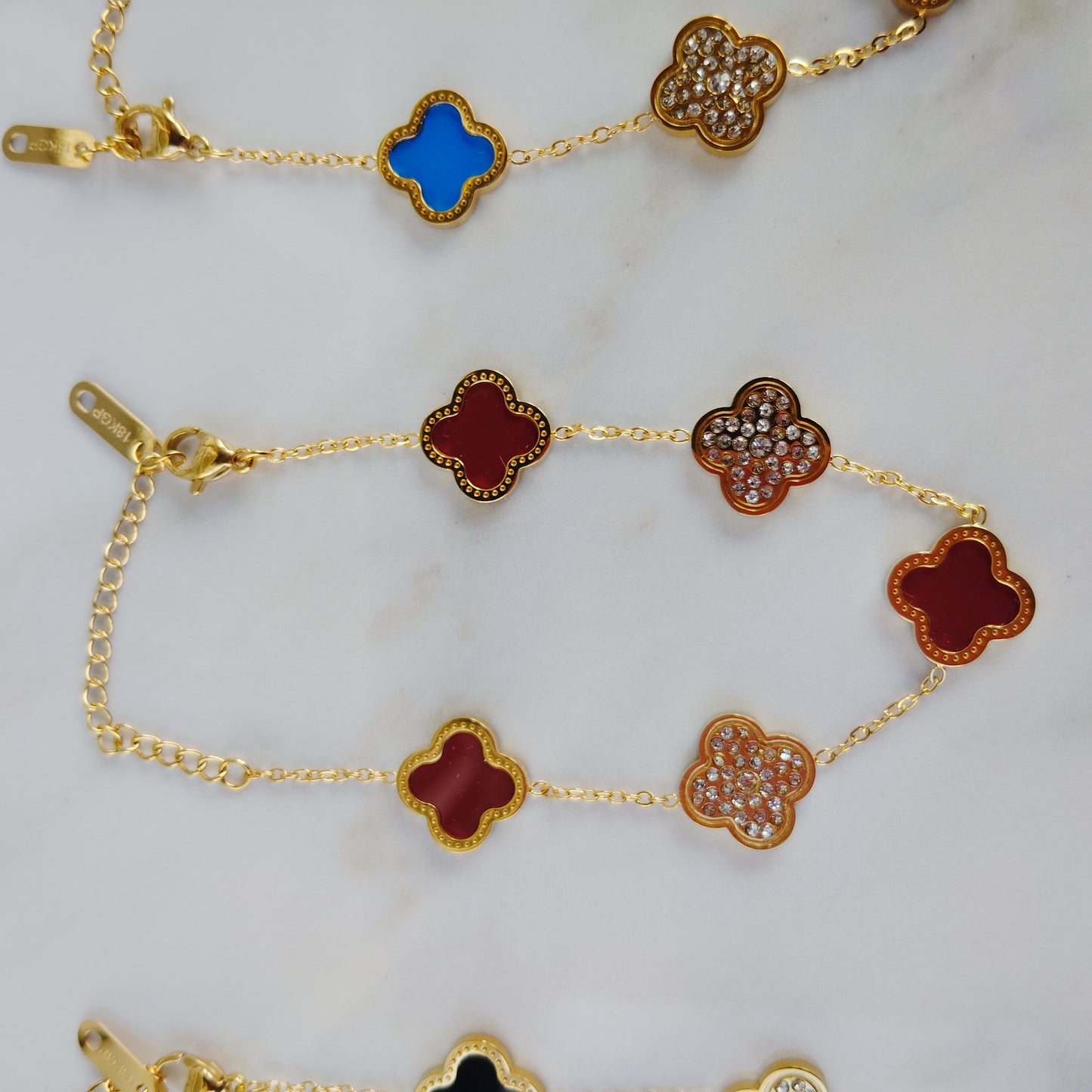 18K Gold PVD plated stainless steel red flower diamond bracelet.