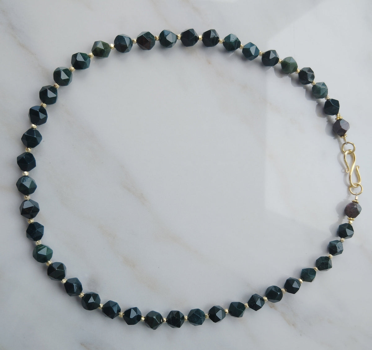 Handcrafted Gold vermmeil and diamond cut Jasper beaded necklace with a gold vermmeil toggle clasp.17 inches .
