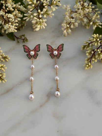 Butterfly and pearl earrings
