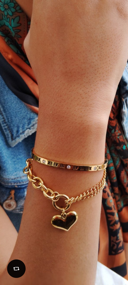 Puff heart in chains bracelet. 18K gold triple plated stainless steel.