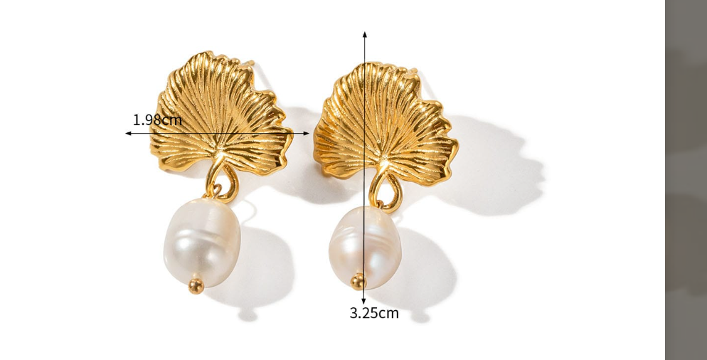 Dainty leaf earrings and necklace set. 18K gold triple plated stainless steel.