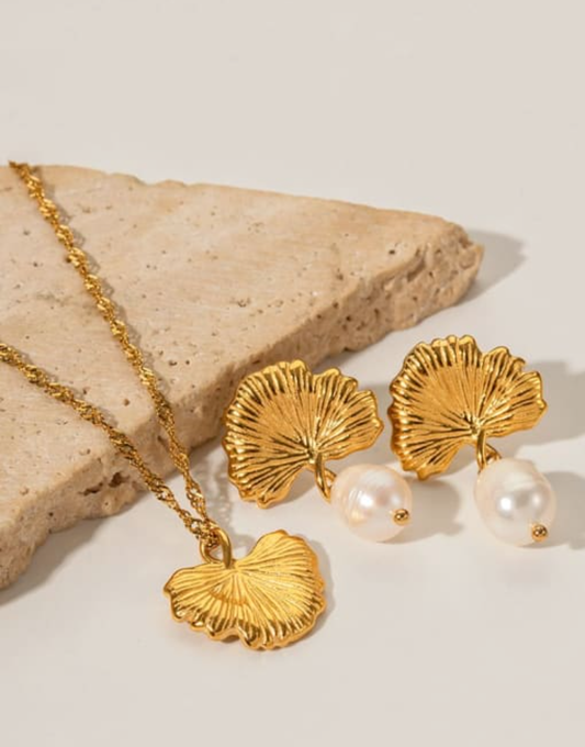 Dainty leaf earrings and necklace set. 18K gold triple plated stainless steel.