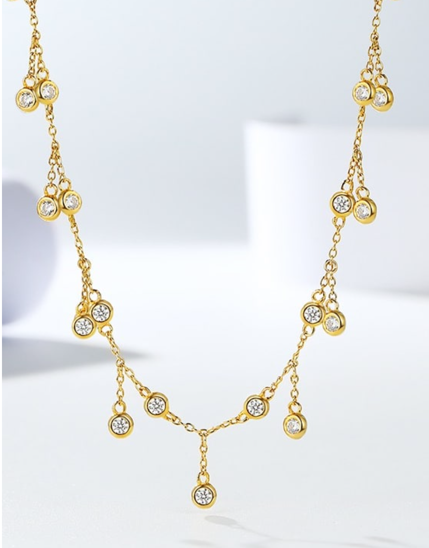 925 Sterling silver Sparkle drop necklace 18 karat gold-plated with hanging crystal pendants.