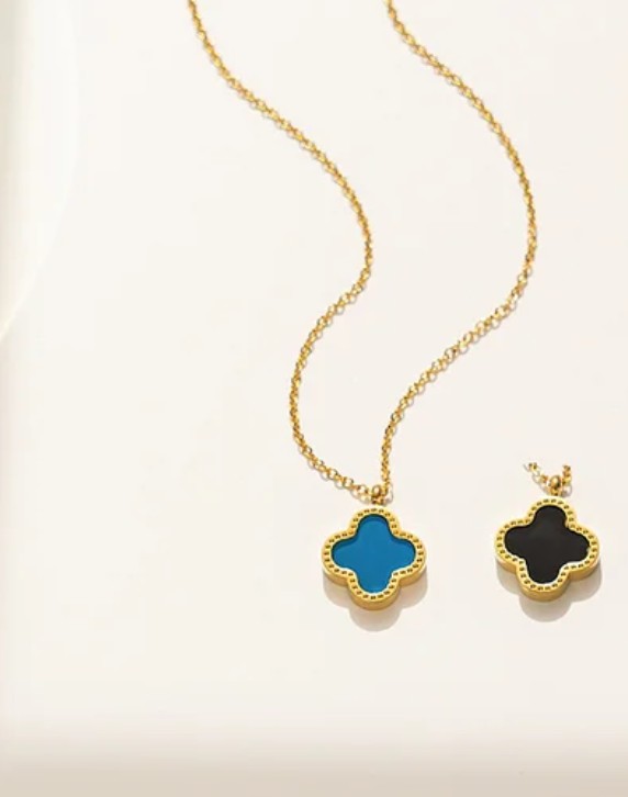 18K gold PVD plated stainless steel blue flower necklace reversible to black.