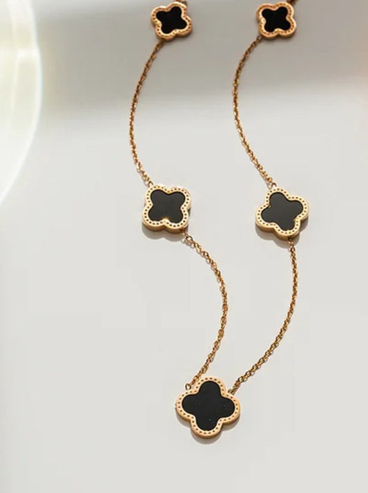 18k gold plated stainless steel black flower necklace.