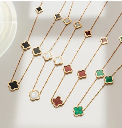18k gold plated stainless steel black flower necklace.